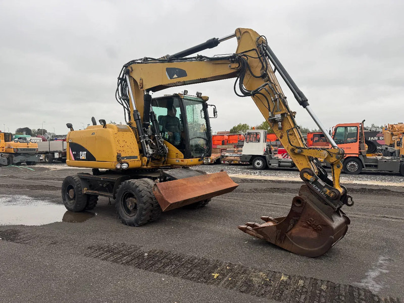 Caterpillar M313D 7212 HOURS - Pyöräalustainen kaivinkone: kuva Caterpillar M313D 7212 HOURS - Pyöräalustainen kaivinkone Caterpillar M313D 7212 HOURS - Pyöräalustainen kaivinkone: kuva Caterpillar M313D 7212 HOURS - Pyöräalustainen kaivinkone