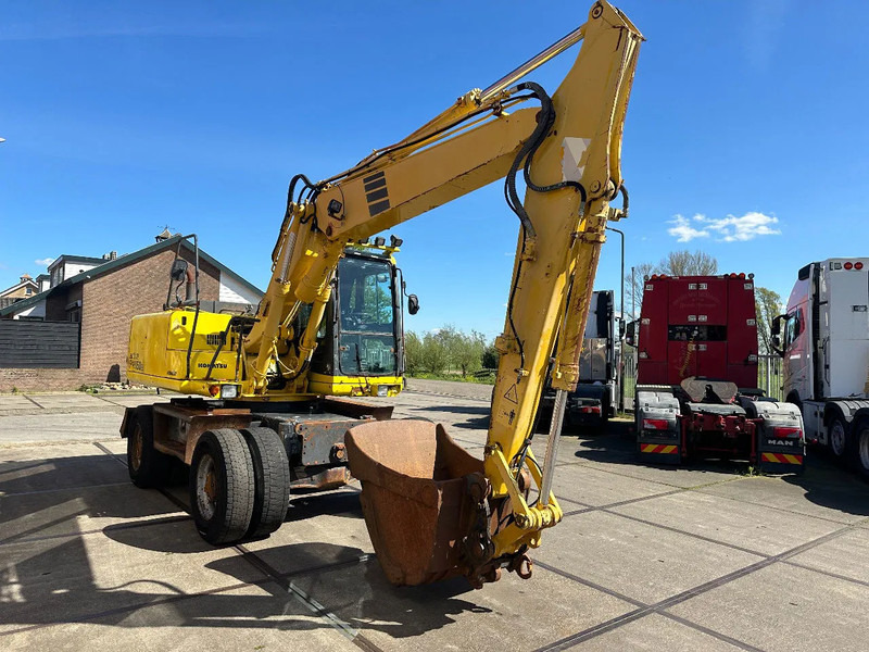 Komatsu PW150ES-6K CE - Pyöräalustainen kaivinkone: kuva Komatsu PW150ES-6K CE - Pyöräalustainen kaivinkone Komatsu PW150ES-6K CE - Pyöräalustainen kaivinkone: kuva Komatsu PW150ES-6K CE - Pyöräalustainen kaivinkone