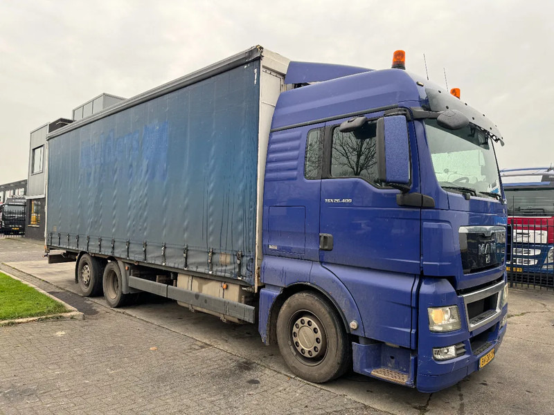 MAN TGX 26.400 6X2 - EURO 4 + LIFT + STEERING AXLE - Pressukapelli kuorma-auto: kuva MAN TGX 26.400 6X2 - EURO 4 + LIFT + STEERING AXLE - Pressukapelli kuorma-auto MAN TGX 26.400 6X2 - EURO 4 + LIFT + STEERING AXLE - Pressukapelli kuorma-auto: kuva MAN TGX 26.400 6X2 - EURO 4 + LIFT + STEERING AXLE - Pressukapelli kuorma-auto