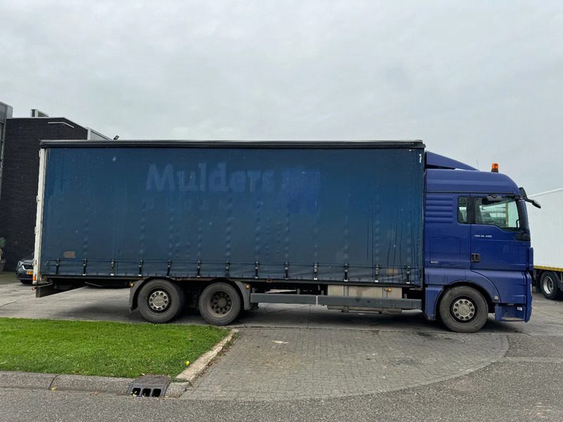 MAN TGX 26.400 6X2 - EURO 4 + LIFT + STEERING AXLE + TÜV 10-2025 - Pressukapelli kuorma-auto: kuva MAN TGX 26.400 6X2 - EURO 4 + LIFT + STEERING AXLE + TÜV 10-2025 - Pressukapelli kuorma-auto MAN TGX 26.400 6X2 - EURO 4 + LIFT + STEERING AXLE + TÜV 10-2025 - Pressukapelli kuorma-auto: kuva MAN TGX 26.400 6X2 - EURO 4 + LIFT + STEERING AXLE + TÜV 10-2025 - Pressukapelli kuorma-auto