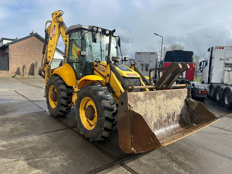 New Holland LB115B, CE, 240 MM MULTI PURPOSE LOADER BUCKET, 800 MM BACHOE DIGGING BUCKET, FLIP OVER FORKS, AIR CONDITIONER - Kaivuri-trukki: kuva New Holland LB115B, CE, 240 MM MULTI PURPOSE LOADER BUCKET, 800 MM BACHOE DIGGING BUCKET, FLIP OVER FORKS, AIR CONDITIONER - Kaivuri-trukki New Holland LB115B, CE, 240 MM MULTI PURPOSE LOADER BUCKET, 800 MM BACHOE DIGGING BUCKET, FLIP OVER FORKS, AIR CONDITIONER - Kaivuri-trukki: kuva New Holland LB115B, CE, 240 MM MULTI PURPOSE LOADER BUCKET, 800 MM BACHOE DIGGING BUCKET, FLIP OVER FORKS, AIR CONDITIONER - Kaivuri-trukki