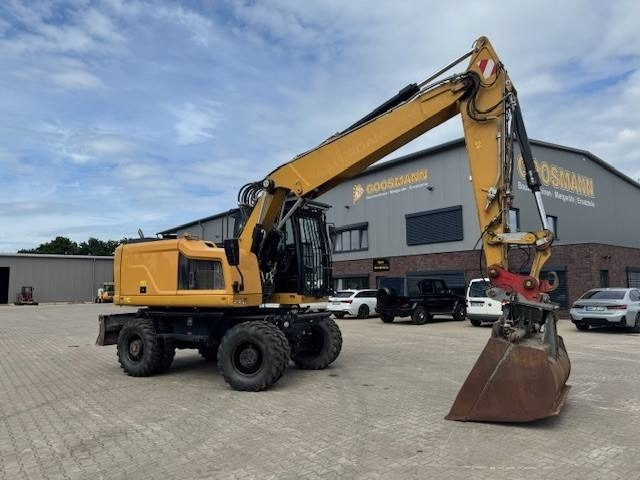 CAT M 318F - Pyöräalustainen kaivinkone: kuva CAT M 318F - Pyöräalustainen kaivinkone CAT M 318F - Pyöräalustainen kaivinkone: kuva CAT M 318F - Pyöräalustainen kaivinkone