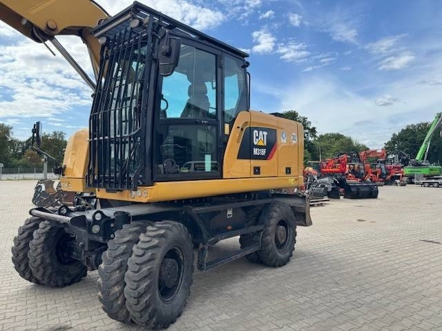CAT M 318F - Pyöräalustainen kaivinkone: kuva CAT M 318F - Pyöräalustainen kaivinkone CAT M 318F - Pyöräalustainen kaivinkone: kuva CAT M 318F - Pyöräalustainen kaivinkone