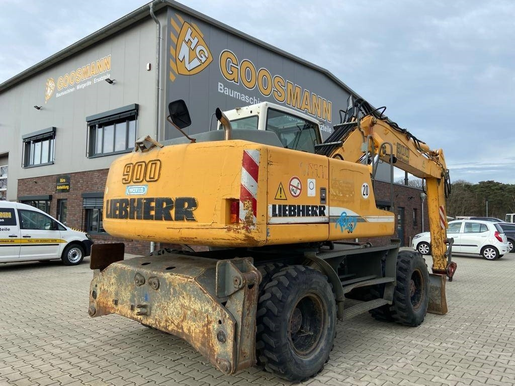 Liebherr A 900 C Litronic - Pyöräalustainen kaivinkone: kuva Liebherr A 900 C Litronic - Pyöräalustainen kaivinkone Liebherr A 900 C Litronic - Pyöräalustainen kaivinkone: kuva Liebherr A 900 C Litronic - Pyöräalustainen kaivinkone