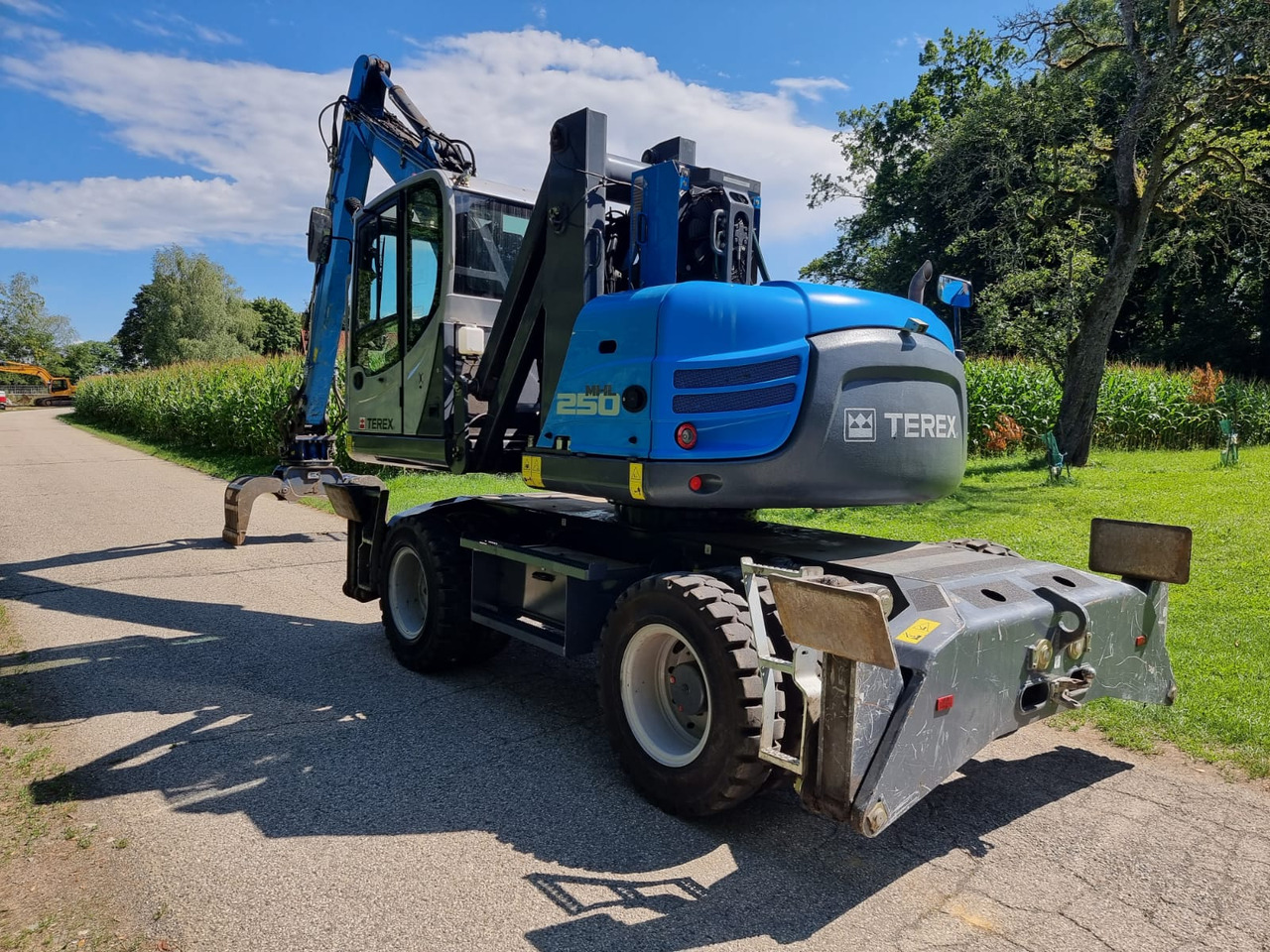 FUCHS MHL 250 - Pyöräalustainen kaivinkone: kuva FUCHS MHL 250 - Pyöräalustainen kaivinkone FUCHS MHL 250 - Pyöräalustainen kaivinkone: kuva FUCHS MHL 250 - Pyöräalustainen kaivinkone