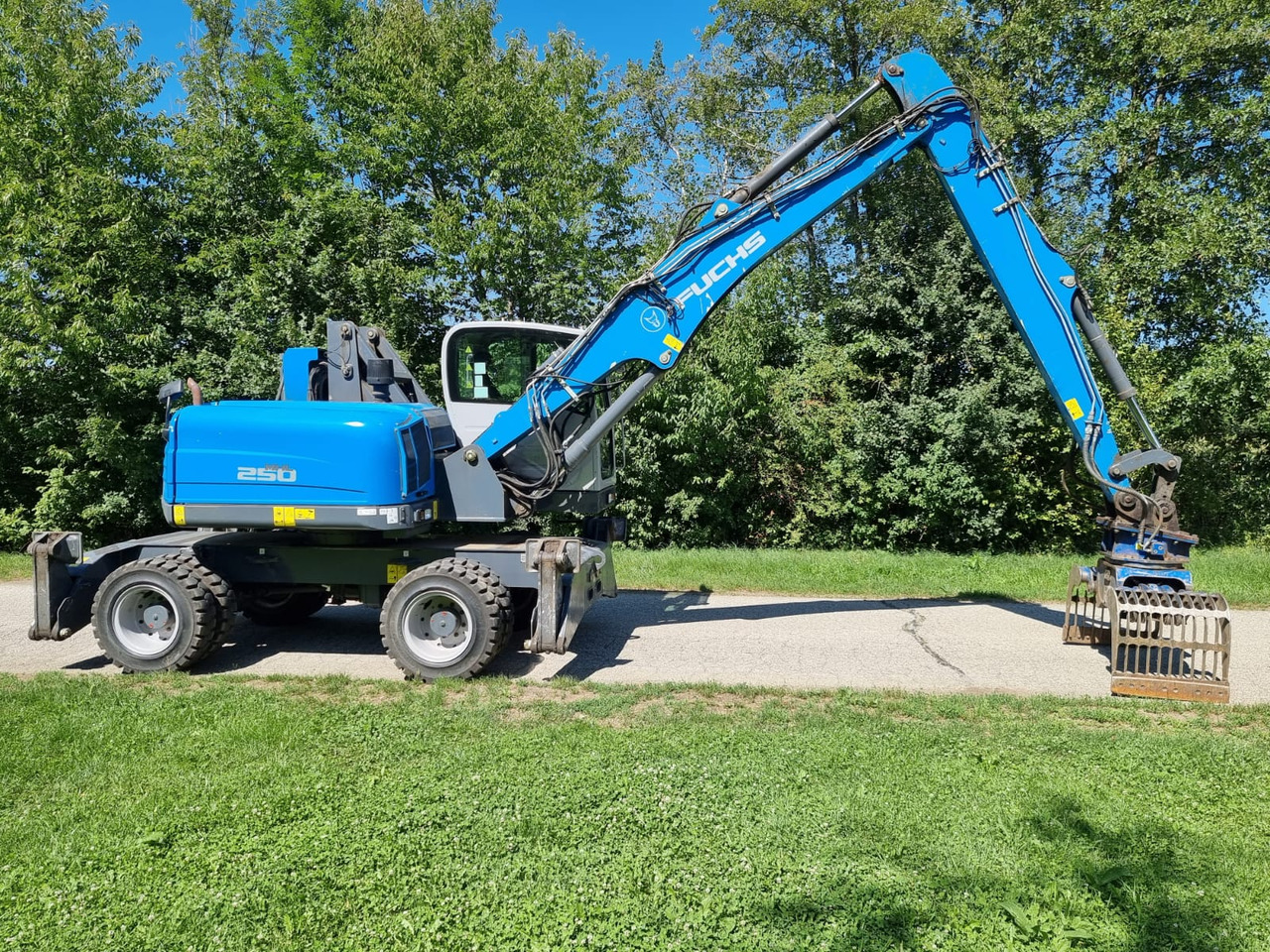 FUCHS MHL 250 - Pyöräalustainen kaivinkone: kuva FUCHS MHL 250 - Pyöräalustainen kaivinkone FUCHS MHL 250 - Pyöräalustainen kaivinkone: kuva FUCHS MHL 250 - Pyöräalustainen kaivinkone