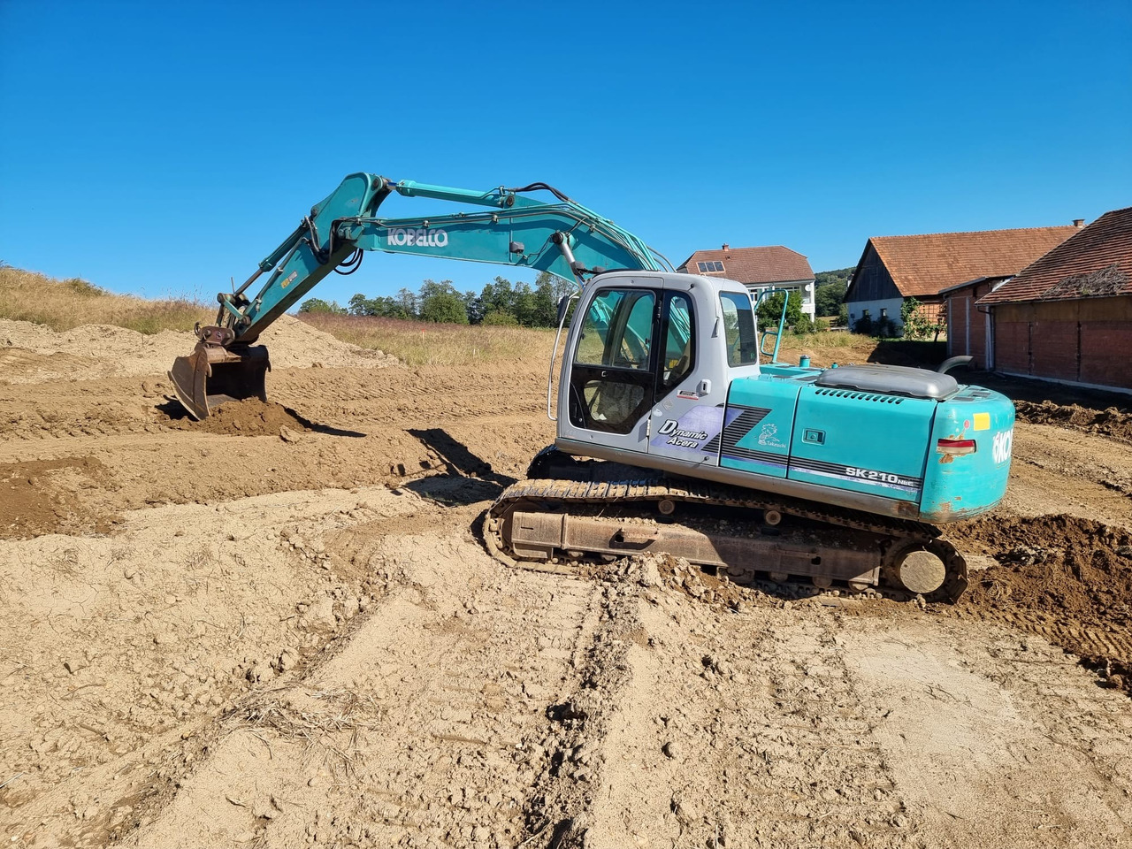 KOBELCO SK 210 NLC-6E - Telakaivukone: kuva KOBELCO SK 210 NLC-6E - Telakaivukone KOBELCO SK 210 NLC-6E - Telakaivukone: kuva KOBELCO SK 210 NLC-6E - Telakaivukone