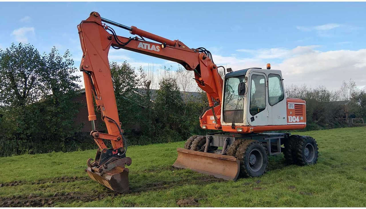1994 ATLAS 1304 WHEELED EXCAVATOR - Pyöräalustainen kaivinkone: kuva 1994 ATLAS 1304 WHEELED EXCAVATOR - Pyöräalustainen kaivinkone 1994 ATLAS 1304 WHEELED EXCAVATOR - Pyöräalustainen kaivinkone: kuva 1994 ATLAS 1304 WHEELED EXCAVATOR - Pyöräalustainen kaivinkone