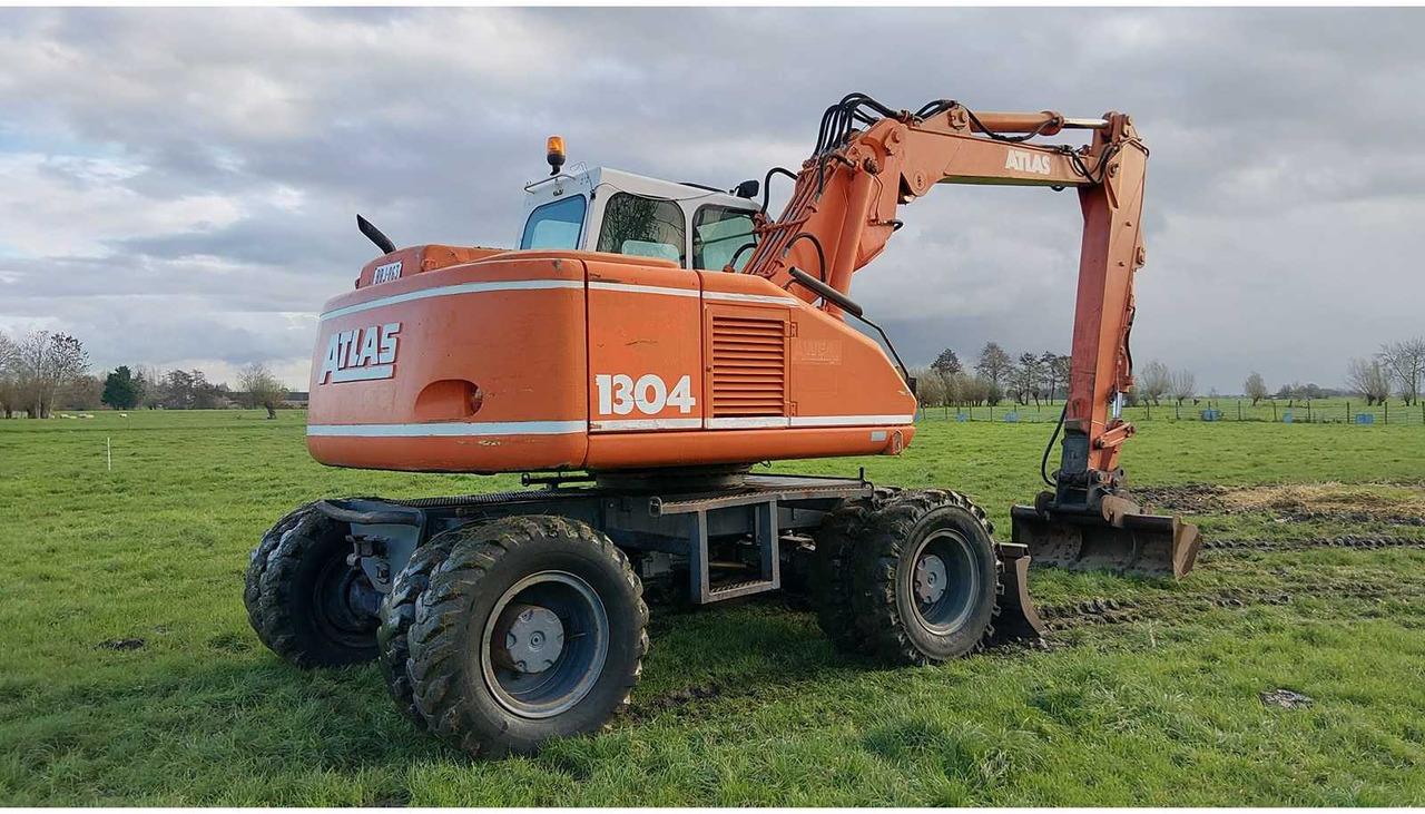 1994 ATLAS 1304 WHEELED EXCAVATOR - Pyöräalustainen kaivinkone: kuva 1994 ATLAS 1304 WHEELED EXCAVATOR - Pyöräalustainen kaivinkone 1994 ATLAS 1304 WHEELED EXCAVATOR - Pyöräalustainen kaivinkone: kuva 1994 ATLAS 1304 WHEELED EXCAVATOR - Pyöräalustainen kaivinkone