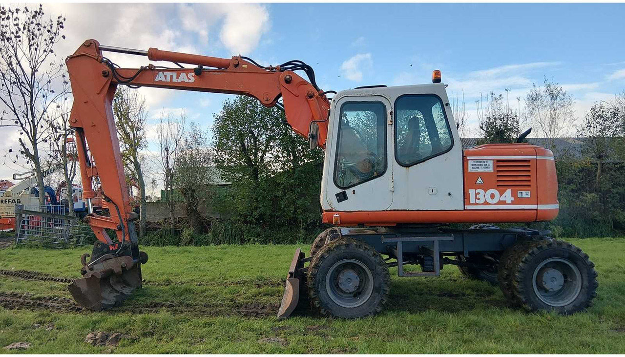 1994 ATLAS 1304 WHEELED EXCAVATOR - Pyöräalustainen kaivinkone: kuva 1994 ATLAS 1304 WHEELED EXCAVATOR - Pyöräalustainen kaivinkone 1994 ATLAS 1304 WHEELED EXCAVATOR - Pyöräalustainen kaivinkone: kuva 1994 ATLAS 1304 WHEELED EXCAVATOR - Pyöräalustainen kaivinkone
