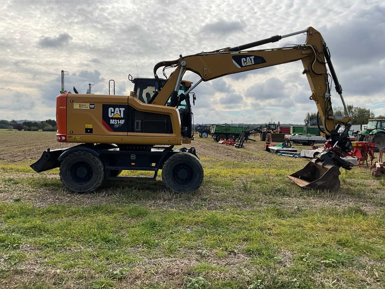 Caterpillar M314F - Pyöräalustainen kaivinkone: kuva Caterpillar M314F - Pyöräalustainen kaivinkone Caterpillar M314F - Pyöräalustainen kaivinkone: kuva Caterpillar M314F - Pyöräalustainen kaivinkone