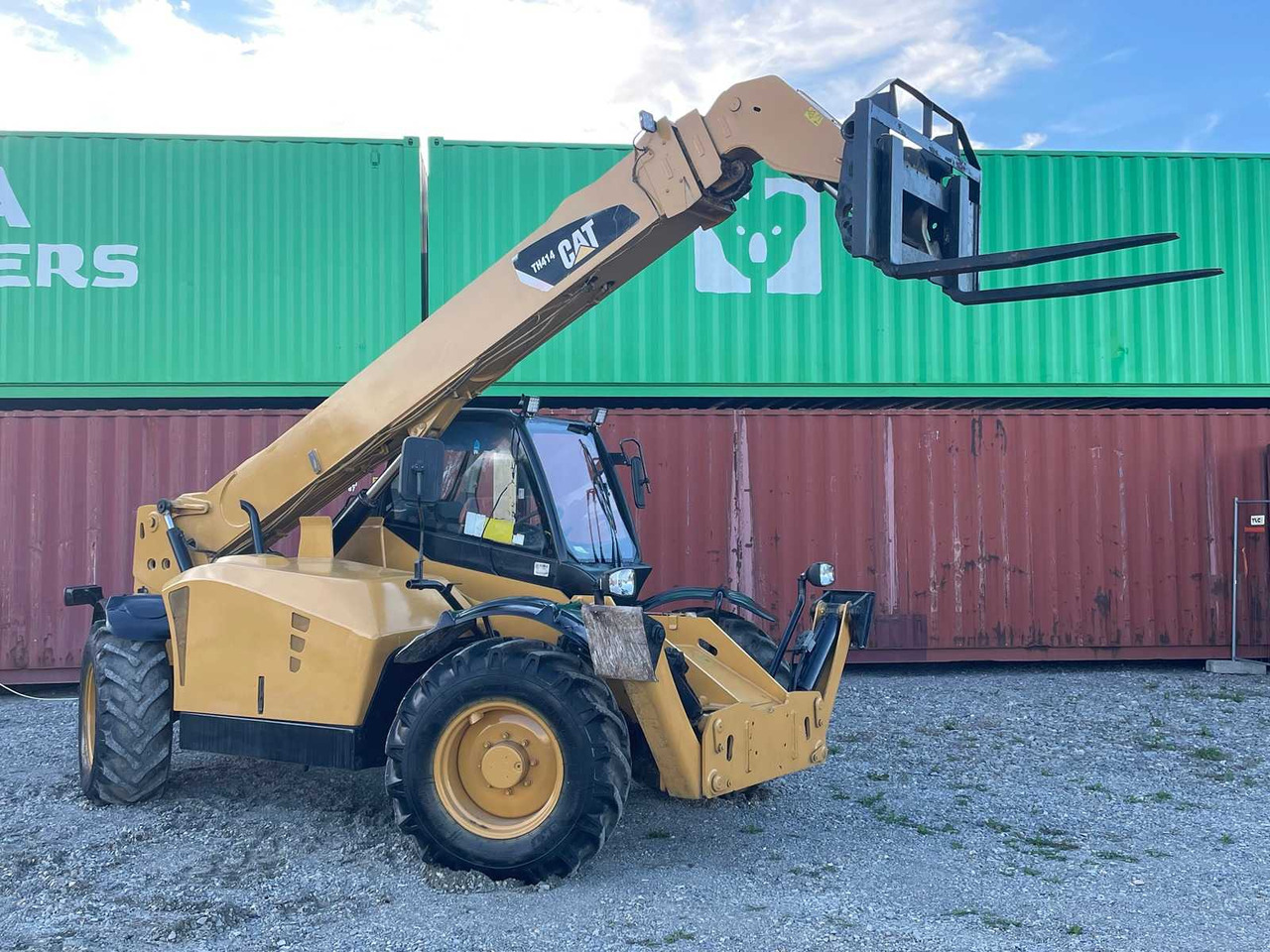 Caterpillar TH414 - Pyöräkuormaaja: kuva Caterpillar TH414 - Pyöräkuormaaja Caterpillar TH414 - Pyöräkuormaaja: kuva Caterpillar TH414 - Pyöräkuormaaja