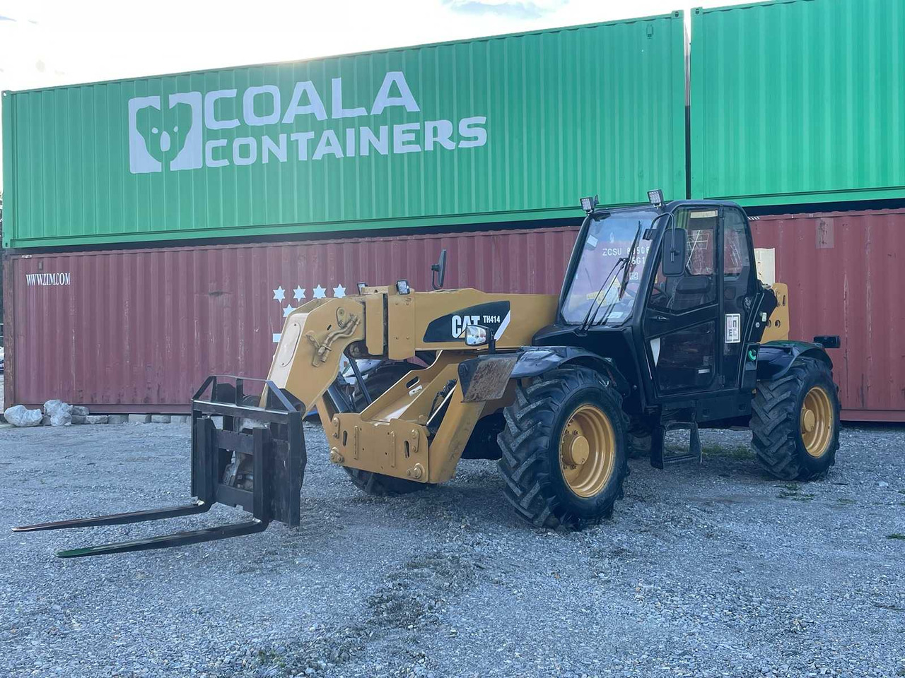 Caterpillar TH414 - Pyöräkuormaaja: kuva Caterpillar TH414 - Pyöräkuormaaja Caterpillar TH414 - Pyöräkuormaaja: kuva Caterpillar TH414 - Pyöräkuormaaja