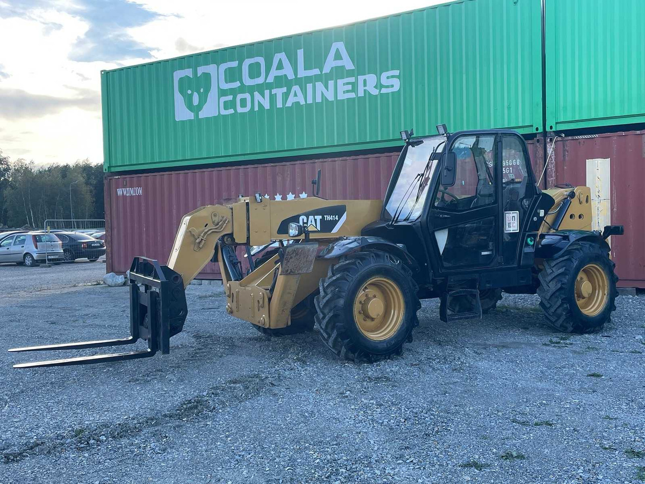 Caterpillar TH414 - Pyöräkuormaaja: kuva Caterpillar TH414 - Pyöräkuormaaja Caterpillar TH414 - Pyöräkuormaaja: kuva Caterpillar TH414 - Pyöräkuormaaja