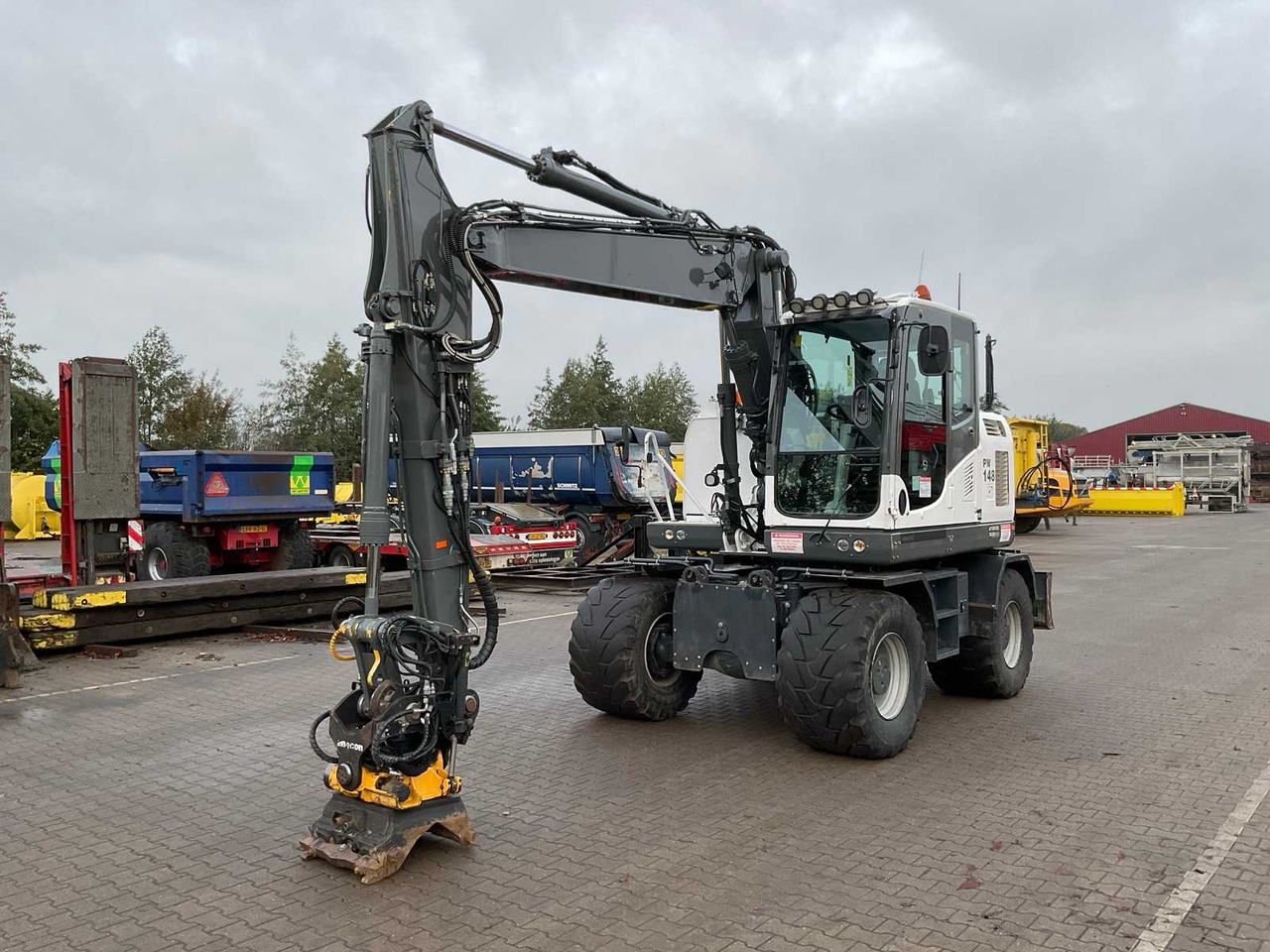 Komatsu PW148-10 - Pyöräalustainen kaivinkone: kuva Komatsu PW148-10 - Pyöräalustainen kaivinkone Komatsu PW148-10 - Pyöräalustainen kaivinkone: kuva Komatsu PW148-10 - Pyöräalustainen kaivinkone