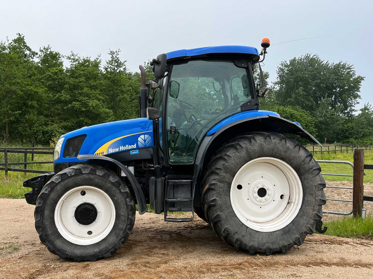 New Holland TS110a delta - Traktori: kuva New Holland TS110a delta - Traktori New Holland TS110a delta - Traktori: kuva New Holland TS110a delta - Traktori