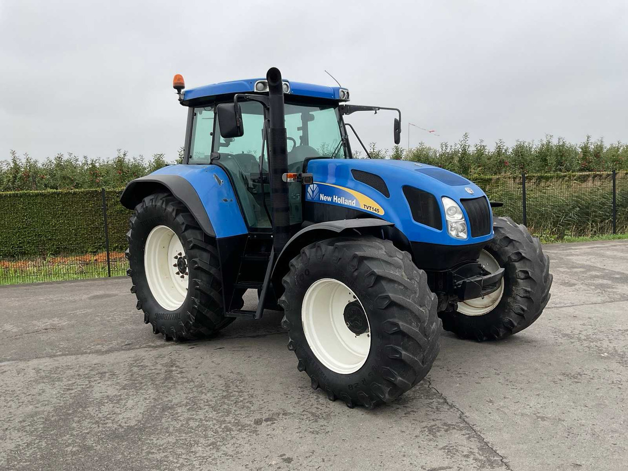 New Holland TVT145 - Traktori: kuva New Holland TVT145 - Traktori New Holland TVT145 - Traktori: kuva New Holland TVT145 - Traktori