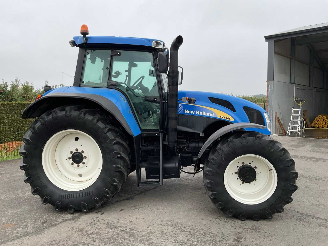 New Holland TVT145 - Traktori: kuva New Holland TVT145 - Traktori New Holland TVT145 - Traktori: kuva New Holland TVT145 - Traktori