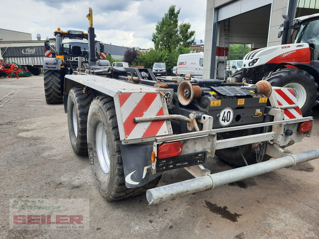 Fliegl HKL 22 Tandem - Vaihtolavaperävaunu/ Nostovarsi vaihtolavaperävaunu: kuva Fliegl HKL 22 Tandem - Vaihtolavaperävaunu/ Nostovarsi vaihtolavaperävaunu Fliegl HKL 22 Tandem - Vaihtolavaperävaunu/ Nostovarsi vaihtolavaperävaunu: kuva Fliegl HKL 22 Tandem - Vaihtolavaperävaunu/ Nostovarsi vaihtolavaperävaunu