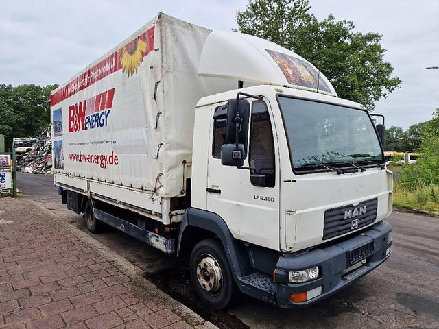 MAN L2000 LE 8.180 - Pressukapelli kuorma-auto: kuva MAN L2000 LE 8.180 - Pressukapelli kuorma-auto MAN L2000 LE 8.180 - Pressukapelli kuorma-auto: kuva MAN L2000 LE 8.180 - Pressukapelli kuorma-auto