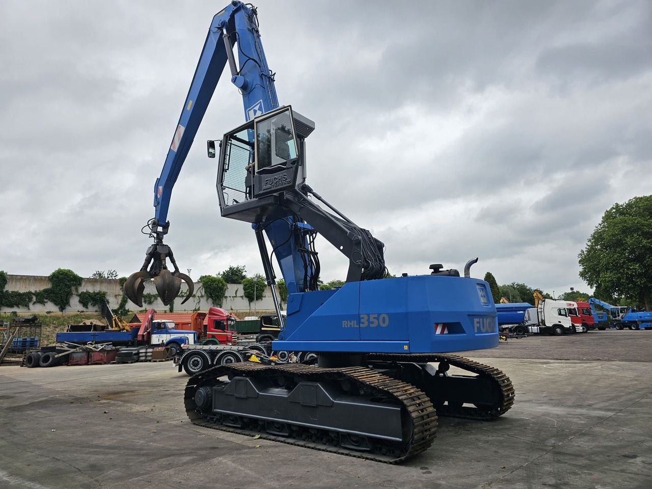 Fuchs RHL 350 Materialhandler With Adjustable Tracks - Materiaalinkäsittelykone: kuva Fuchs RHL 350 Materialhandler With Adjustable Tracks - Materiaalinkäsittelykone Fuchs RHL 350 Materialhandler With Adjustable Tracks - Materiaalinkäsittelykone: kuva Fuchs RHL 350 Materialhandler With Adjustable Tracks - Materiaalinkäsittelykone