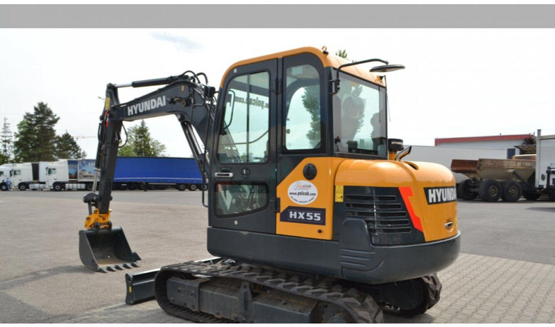 Hyundai HX55 Bager - Minikuormaaja: kuva Hyundai HX55 Bager - Minikuormaaja Hyundai HX55 Bager - Minikuormaaja: kuva Hyundai HX55 Bager - Minikuormaaja