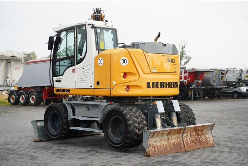 Liebherr 910 COMPACT LITRONIC  / KOPARKA KOŁOWA / KLIMATYZACJA / KAMERA - Pyöräalustainen kaivinkone: kuva Liebherr 910 COMPACT LITRONIC  / KOPARKA KOŁOWA / KLIMATYZACJA / KAMERA - Pyöräalustainen kaivinkone Liebherr 910 COMPACT LITRONIC  / KOPARKA KOŁOWA / KLIMATYZACJA / KAMERA - Pyöräalustainen kaivinkone: kuva Liebherr 910 COMPACT LITRONIC  / KOPARKA KOŁOWA / KLIMATYZACJA / KAMERA - Pyöräalustainen kaivinkone