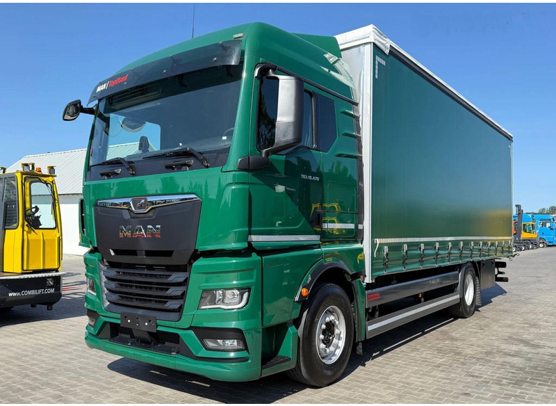 MAN TGX 18.470 - Curtain side - Pressukapelli kuorma-auto: kuva MAN TGX 18.470 - Curtain side - Pressukapelli kuorma-auto MAN TGX 18.470 - Curtain side - Pressukapelli kuorma-auto: kuva MAN TGX 18.470 - Curtain side - Pressukapelli kuorma-auto
