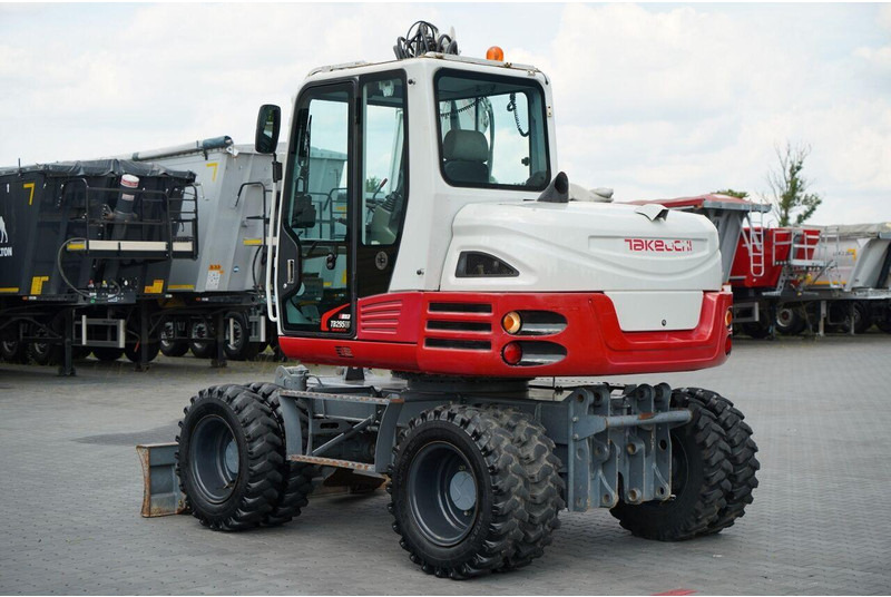 Takeuchi TB 295 W / KOPARKA KOŁOWA / 2016 ROK / PO KONTRAKCIE SERWISOWYM - Pyöräalustainen kaivinkone: kuva Takeuchi TB 295 W / KOPARKA KOŁOWA / 2016 ROK / PO KONTRAKCIE SERWISOWYM - Pyöräalustainen kaivinkone Takeuchi TB 295 W / KOPARKA KOŁOWA / 2016 ROK / PO KONTRAKCIE SERWISOWYM - Pyöräalustainen kaivinkone: kuva Takeuchi TB 295 W / KOPARKA KOŁOWA / 2016 ROK / PO KONTRAKCIE SERWISOWYM - Pyöräalustainen kaivinkone