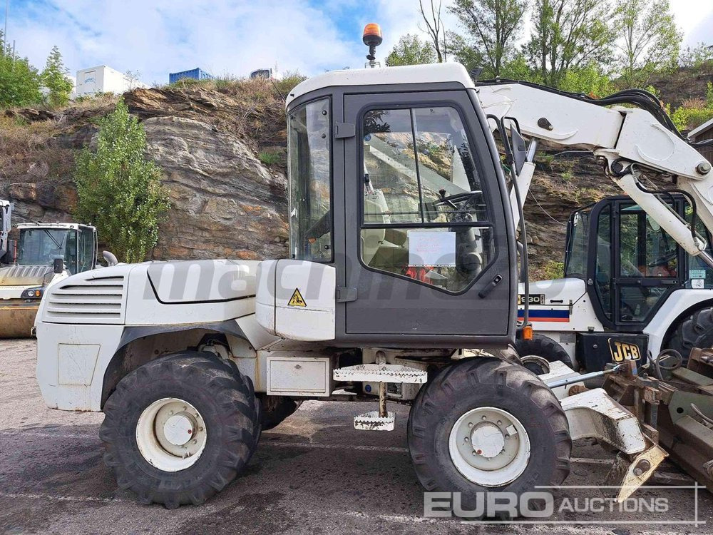 2014 Mecalac 12 MTX - Pyöräalustainen kaivinkone: kuva  2014 Mecalac 12 MTX - Pyöräalustainen kaivinkone 2014 Mecalac 12 MTX - Pyöräalustainen kaivinkone: kuva  2014 Mecalac 12 MTX - Pyöräalustainen kaivinkone