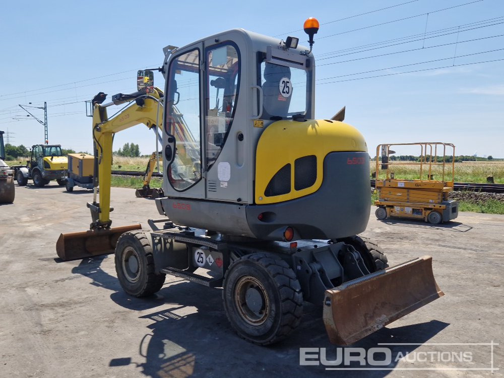 2014 Wacker Neuson 6503-2 - Pyöräalustainen kaivinkone: kuva 2014 Wacker Neuson 6503-2 - Pyöräalustainen kaivinkone 2014 Wacker Neuson 6503-2 - Pyöräalustainen kaivinkone: kuva 2014 Wacker Neuson 6503-2 - Pyöräalustainen kaivinkone