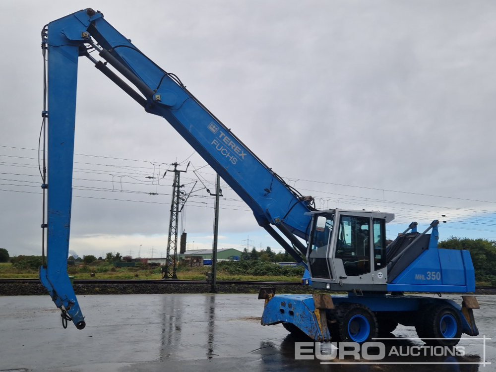 Fuchs MHL350 - Pyöräalustainen kaivinkone: kuva Fuchs MHL350 - Pyöräalustainen kaivinkone Fuchs MHL350 - Pyöräalustainen kaivinkone: kuva Fuchs MHL350 - Pyöräalustainen kaivinkone