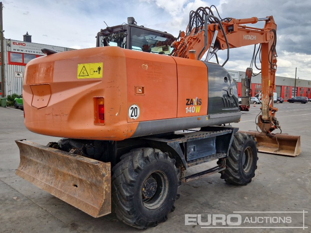 Hitachi ZX140W-3 - Pyöräalustainen kaivinkone: kuva  Hitachi ZX140W-3 - Pyöräalustainen kaivinkone Hitachi ZX140W-3 - Pyöräalustainen kaivinkone: kuva  Hitachi ZX140W-3 - Pyöräalustainen kaivinkone