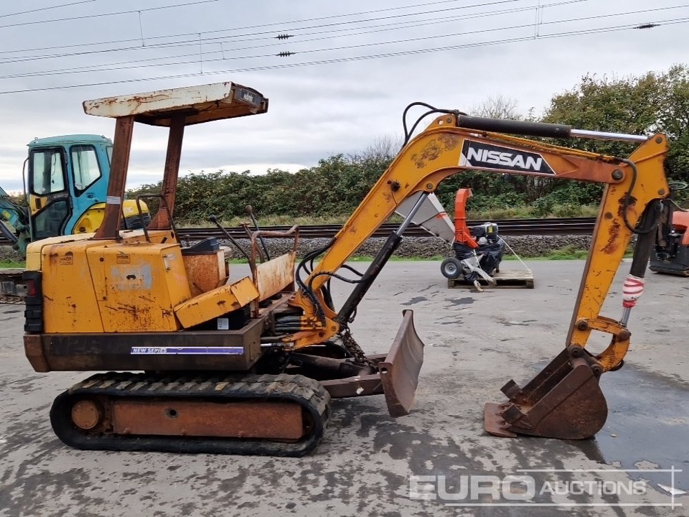 Nissan N260.2 - Minikuormaaja: kuva Nissan N260.2 - Minikuormaaja Nissan N260.2 - Minikuormaaja: kuva Nissan N260.2 - Minikuormaaja