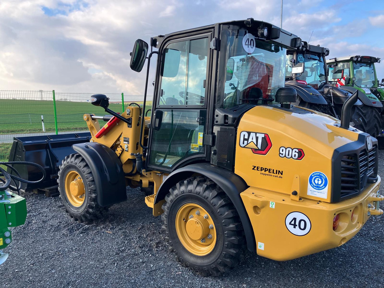 Caterpillar 906 - Pyöräkuormaaja: kuva Caterpillar 906 - Pyöräkuormaaja Caterpillar 906 - Pyöräkuormaaja: kuva Caterpillar 906 - Pyöräkuormaaja