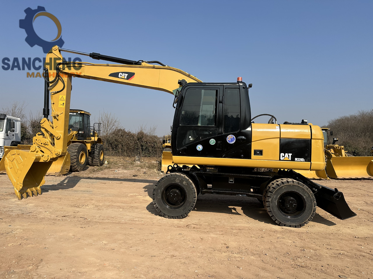 CATERPILLAR M320D2 - Pyöräalustainen kaivinkone: kuva CATERPILLAR M320D2 - Pyöräalustainen kaivinkone CATERPILLAR M320D2 - Pyöräalustainen kaivinkone: kuva CATERPILLAR M320D2 - Pyöräalustainen kaivinkone
