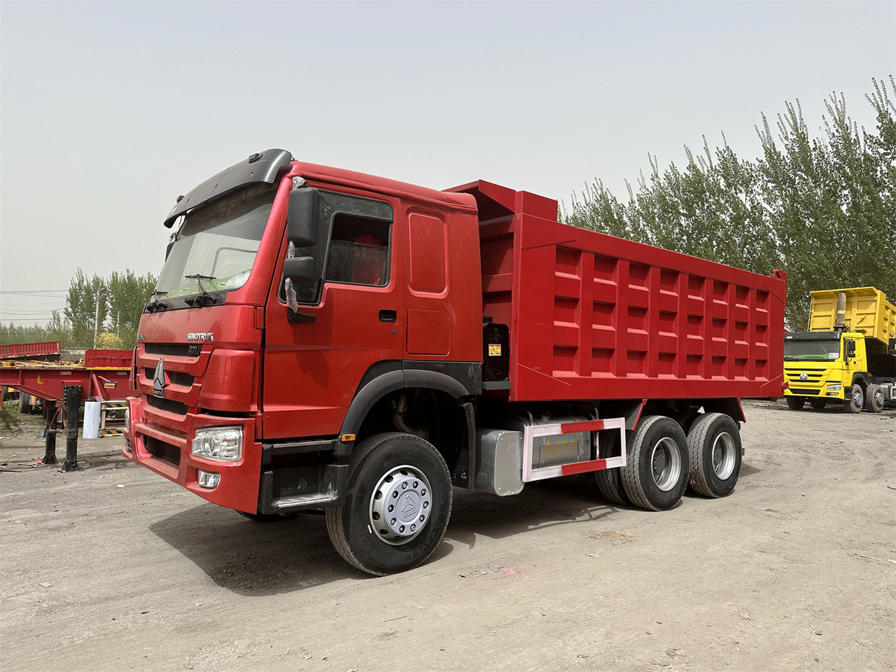 SINOTRUK Howo Dump truck 371 - Kippiauto kuorma-auto: kuva SINOTRUK Howo Dump truck 371 - Kippiauto kuorma-auto SINOTRUK Howo Dump truck 371 - Kippiauto kuorma-auto: kuva SINOTRUK Howo Dump truck 371 - Kippiauto kuorma-auto
