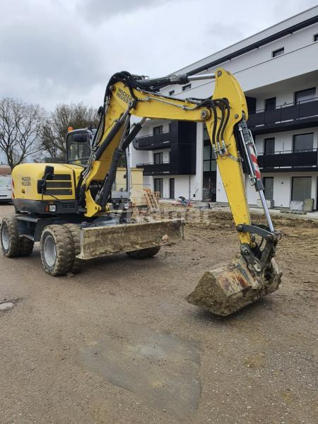 Wacker Neuson EW100 - Pyöräalustainen kaivinkone: kuva Wacker Neuson EW100 - Pyöräalustainen kaivinkone Wacker Neuson EW100 - Pyöräalustainen kaivinkone: kuva Wacker Neuson EW100 - Pyöräalustainen kaivinkone
