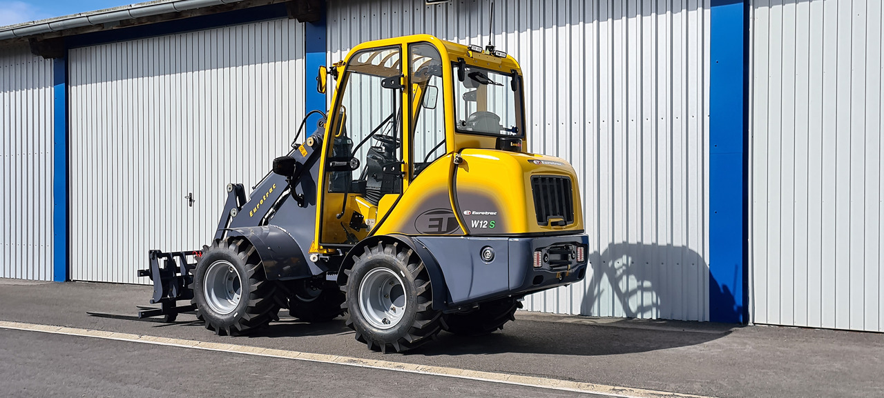 Eurotrac W12 Radlader Hoflader - Pienkuormaaja: kuva Eurotrac W12 Radlader Hoflader - Pienkuormaaja Eurotrac W12 Radlader Hoflader - Pienkuormaaja: kuva Eurotrac W12 Radlader Hoflader - Pienkuormaaja