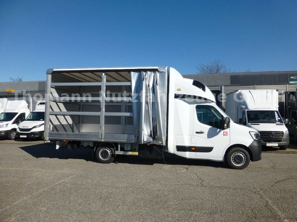 Uusi Pressukapelli tavara-auto Renault Pritsche Plane mit Schlafkabine hinten: kuva Uusi Pressukapelli tavara-auto Renault Pritsche Plane mit Schlafkabine hinten