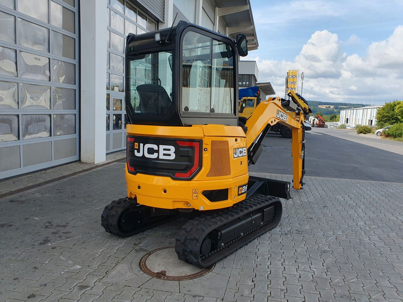 JCB 26C-1 Pro Cab / Neufahrzeug / Planierschild - Minikuormaaja: kuva JCB 26C-1 Pro Cab / Neufahrzeug / Planierschild - Minikuormaaja JCB 26C-1 Pro Cab / Neufahrzeug / Planierschild - Minikuormaaja: kuva JCB 26C-1 Pro Cab / Neufahrzeug / Planierschild - Minikuormaaja