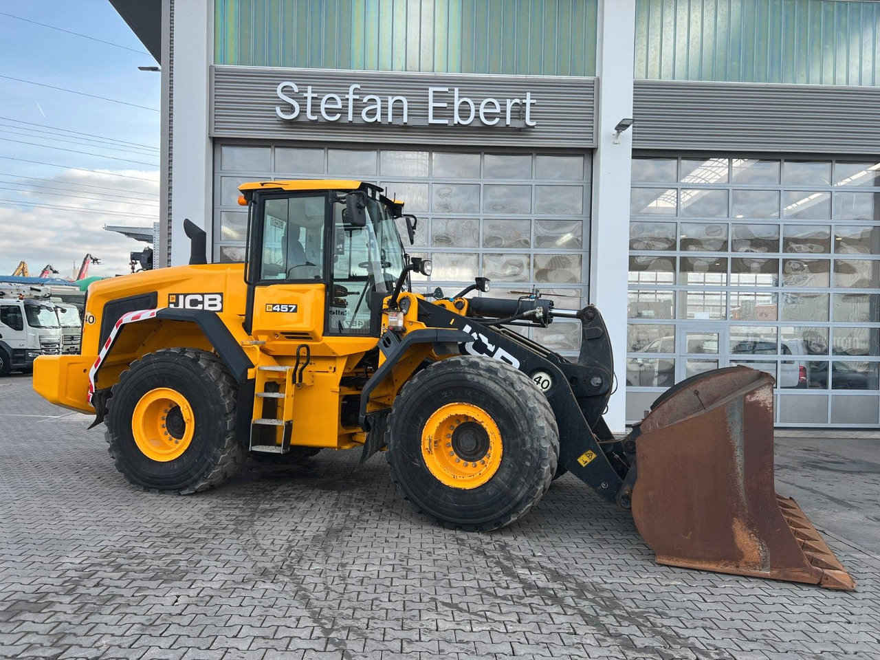JCB 457 ZX T4F / 3.246 h / 2016 / Waage mit Drucker - Pyöräkuormaaja: kuva JCB 457 ZX T4F / 3.246 h / 2016 / Waage mit Drucker - Pyöräkuormaaja JCB 457 ZX T4F / 3.246 h / 2016 / Waage mit Drucker - Pyöräkuormaaja: kuva JCB 457 ZX T4F / 3.246 h / 2016 / Waage mit Drucker - Pyöräkuormaaja