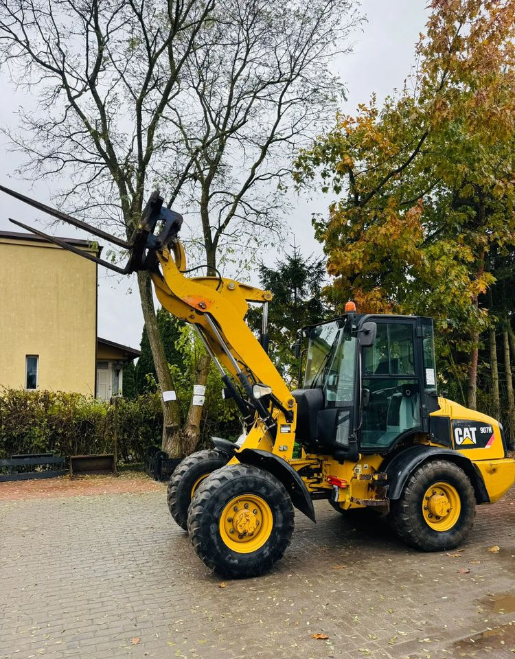 Caterpillar 907H - Pyöräkuormaaja: kuva  Caterpillar 907H - Pyöräkuormaaja Caterpillar 907H - Pyöräkuormaaja: kuva  Caterpillar 907H - Pyöräkuormaaja