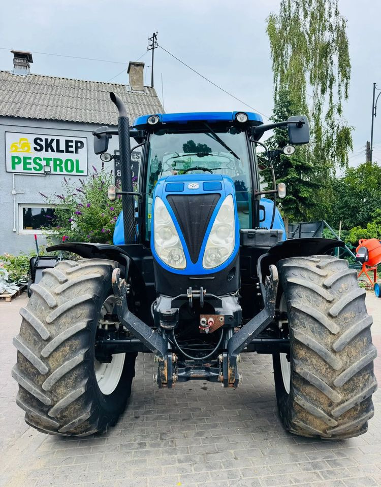 New Holland T7.210 - Traktori: kuva New Holland T7.210 - Traktori New Holland T7.210 - Traktori: kuva New Holland T7.210 - Traktori
