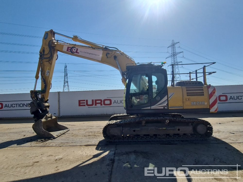 2022 Kobelco SK210LC - Telakaivukone: kuva 2022 Kobelco SK210LC - Telakaivukone 2022 Kobelco SK210LC - Telakaivukone: kuva 2022 Kobelco SK210LC - Telakaivukone