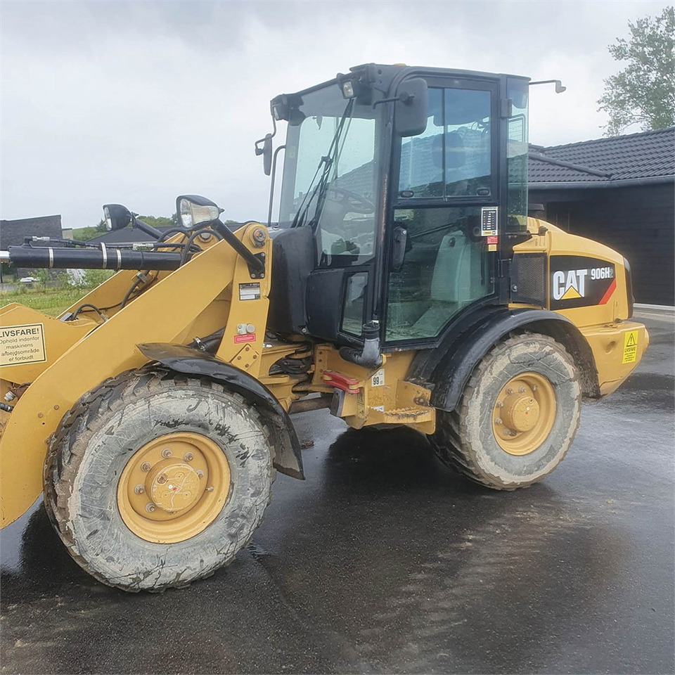 Caterpillar 906 H2 - Pyöräkuormaaja: kuva Caterpillar 906 H2 - Pyöräkuormaaja Caterpillar 906 H2 - Pyöräkuormaaja: kuva Caterpillar 906 H2 - Pyöräkuormaaja