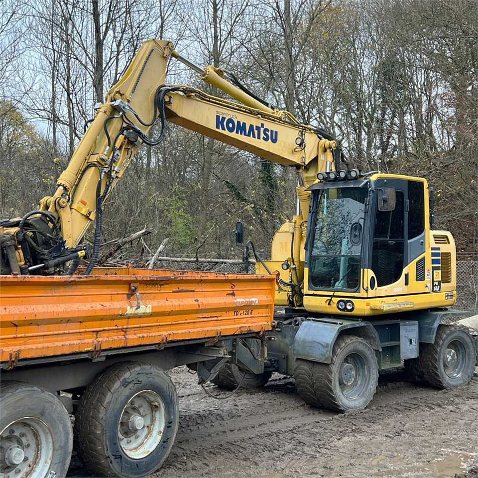 Komatsu PW148-10 - Pyöräalustainen kaivinkone: kuva Komatsu PW148-10 - Pyöräalustainen kaivinkone Komatsu PW148-10 - Pyöräalustainen kaivinkone: kuva Komatsu PW148-10 - Pyöräalustainen kaivinkone
