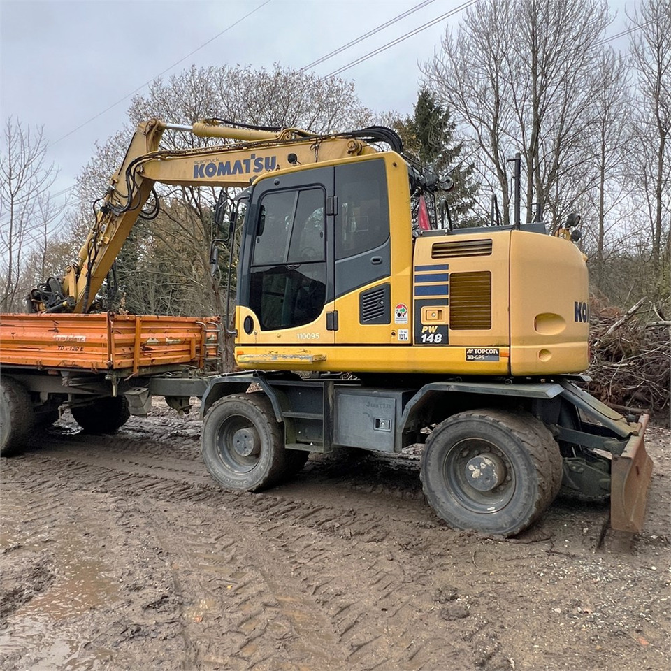 Komatsu PW148-10 - Pyöräalustainen kaivinkone: kuva Komatsu PW148-10 - Pyöräalustainen kaivinkone Komatsu PW148-10 - Pyöräalustainen kaivinkone: kuva Komatsu PW148-10 - Pyöräalustainen kaivinkone