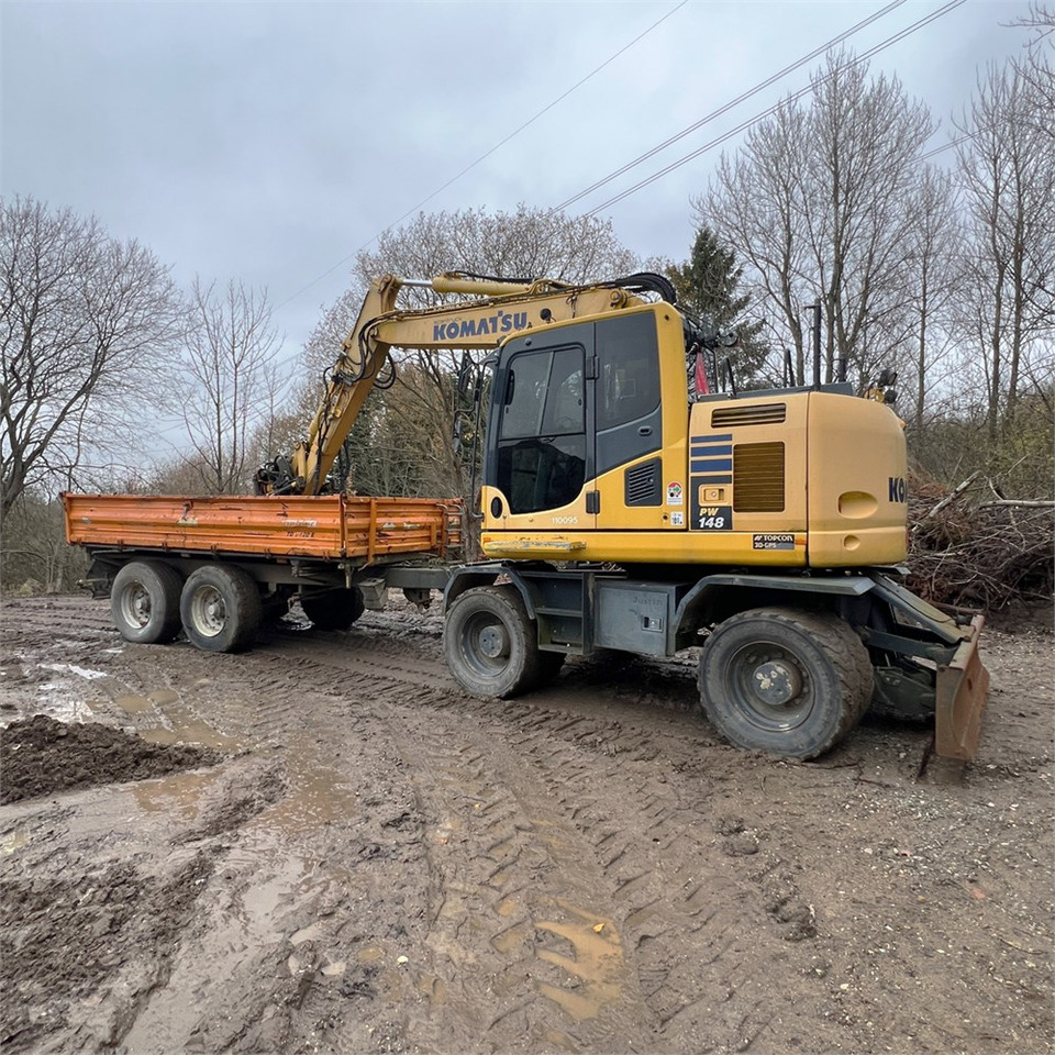 Komatsu PW148-10 - Pyöräalustainen kaivinkone: kuva Komatsu PW148-10 - Pyöräalustainen kaivinkone Komatsu PW148-10 - Pyöräalustainen kaivinkone: kuva Komatsu PW148-10 - Pyöräalustainen kaivinkone