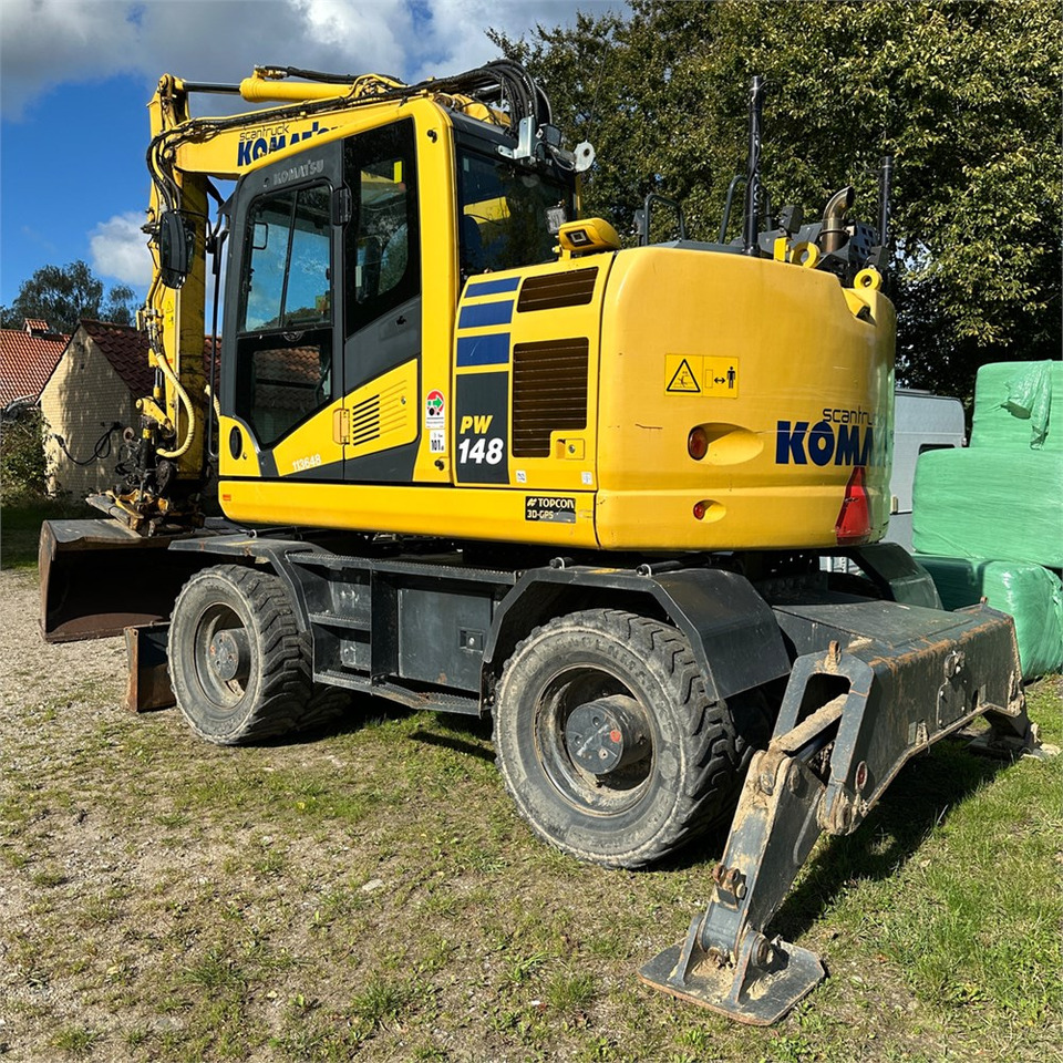 Komatsu PW148-11 - Pyöräalustainen kaivinkone: kuva Komatsu PW148-11 - Pyöräalustainen kaivinkone Komatsu PW148-11 - Pyöräalustainen kaivinkone: kuva Komatsu PW148-11 - Pyöräalustainen kaivinkone